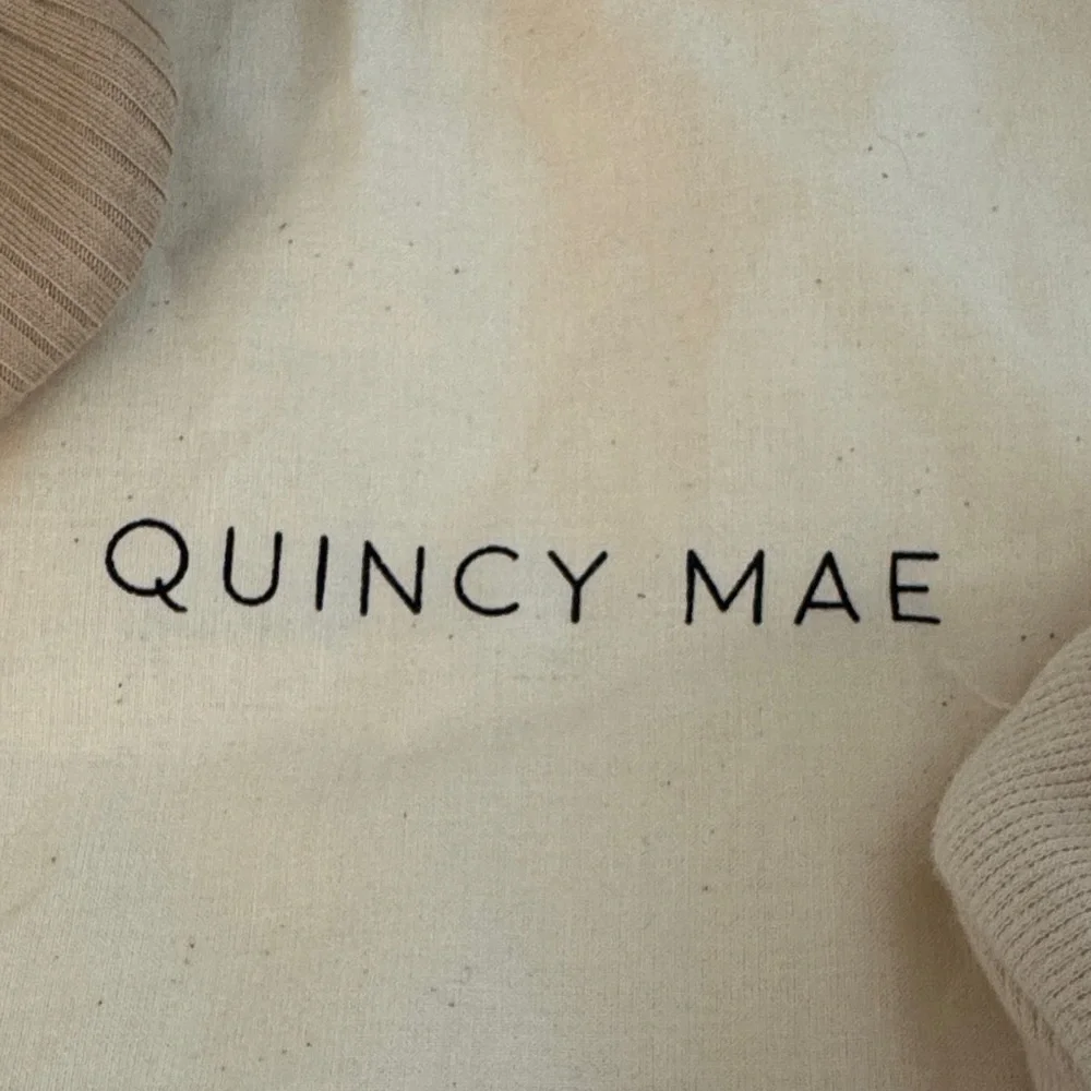 Quincy Mae Baby Ribbed Booties in Beige and Cream